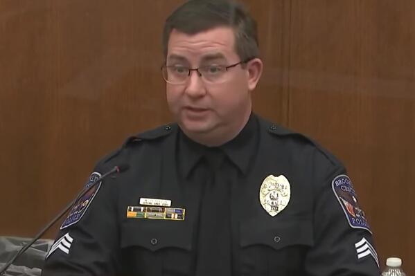 In this screen grab from video, Brooklyn Center Police Sgt. Mike Peterson testifies, as Hennepin County Judge Regina Chu presides over court Tuesday, Dec. 14, 2021, in the trial of former Brooklyn Center police Officer Kim Potter in the April 11, 2021, death of Daunte Wright, at the Hennepin County Courthouse in Minneapolis, Minn. (Court TV via AP, Pool)