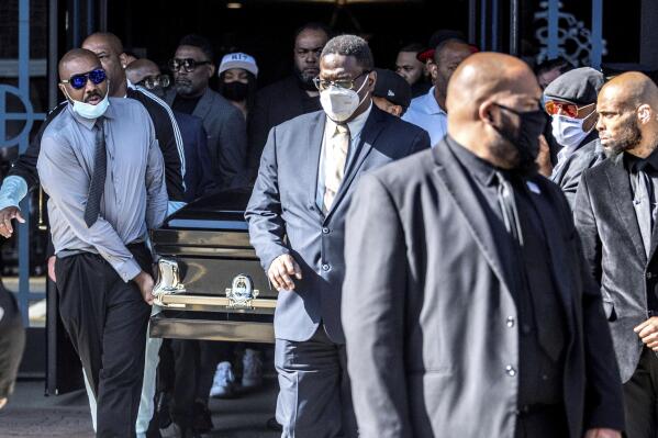 People leave the funeral services for the late Marcel Theo Hall, aka "Biz Markie" at the Patchogue Theater for the Performing Arts on Monday Aug. 2, 2021 in Patchogue, NY. (Alejandra Villa Loarca/Newsday via AP)