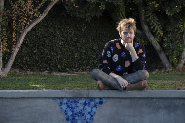 Finneas O'Connell poses at his home in Los Angeles on Friday Dec. 4 2020. O'Connell has been named one of The Associated Press' Breakthrough Entertainers of 2020. (Photo by Rebecca Cabage/Invision/AP)