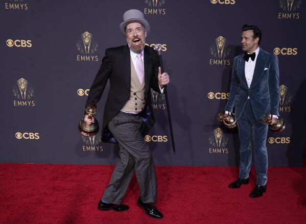 Brendan Hunt, left, and Jason Sudeikis pose with their awards for outstanding comedy series and outstanding lead actor in a comedy series for "Ted Lasso" at the 73rd Primetime Emmy Awards on Sunday, Sept. 19, 2021, at L.A. Live in Los Angeles. (AP Photo/Chris Pizzello)