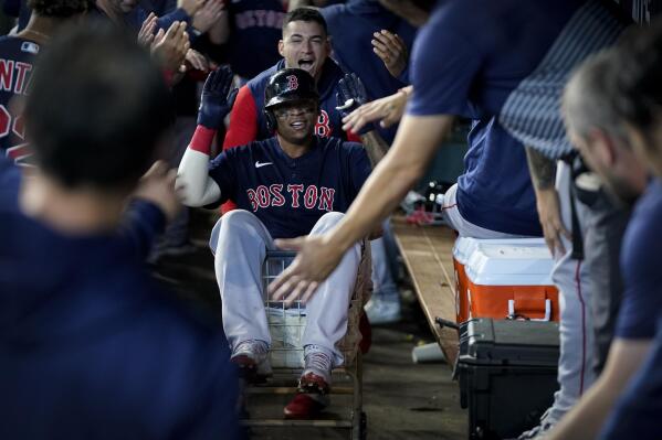 Boston hits 2 grand slams to even ALCS with Astros