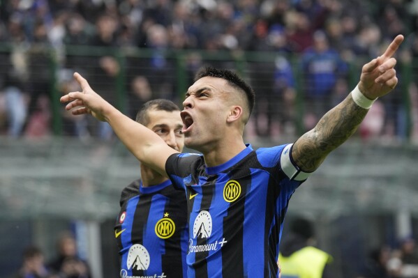 Up and down: Inter title hopes rise as midfielder's shorts are pulled down  during win