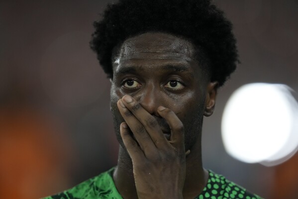 Nigeria's Ola Aina reacts after the African Cup of Nations final soccer match between Ivory Coast and Nigeria, at the Olympic Stadium of Ebimpe in Abidjan, Ivory Coast, Sunday, Feb. 11, 2024. Ivory Coast won the match 2-1. (APPhoto/Themba Hadebe)