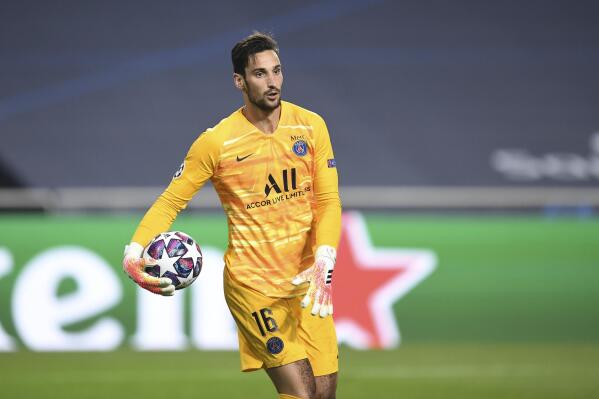 FILE - PSG's goalkeeper Sergio Rico holds the ball during the Champions League semifinal soccer match between RB Leipzig and Paris Saint-Germain at the Luz stadium in Lisbon, Portugal, Tuesday, Aug. 18, 2020. Paris Saint-Germain goalkeeper Sergio Rico has been hospitalized with a head injury after a horse-riding accident in Spain. (David Ramos/Pool Photo via AP, File)