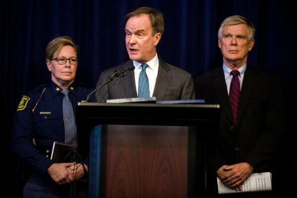 
              Attorney General Bill Schuette announces an open and ongoing investigation into the systemic issues with sexual misconduct at Michigan State University that began in 2017 on Saturday, Jan. 27, 2018 at the G. Mennen Williams Building in Lansing, Mich.  Schuette said  that the independent probe will shine a bright light on every corner of the university.    (Jake May/The Flint Journal-MLive.com via AP)
            