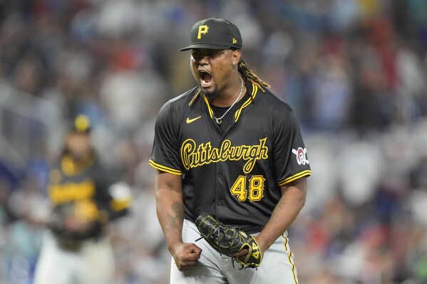 Pittsburgh Pirates starting pitcher Luis Ortiz reacts as he finishes the 11th inning of a baseball game against the Miami Marlins, Thursday, March 28, 2024, in Miami. The Pirates beat the Marlins 6-5, in 12 innings. (AP Photo/Wilfredo Lee)