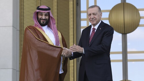 FILE - Turkish President Recep Tayyip Erdogan, right, and Saudi Crown Prince Mohammed bin Salman shake hands during a welcome ceremony, in Ankara, Turkey, Wednesday, June 22, 2022. Erdogan is beginning a three-stop tour of Gulf states to raise trade and investment for Turkey’s floundering economy. The president will arrive in Jeddah, Saudi Arabia, on Monday, July 17, 2023, accompanied by an entourage of some 200 businesspeople. Business forums have been arranged in Saudi Arabia, Qatar and the United Arab Emirate. (AP Photo/Burhan Ozbilici, File)