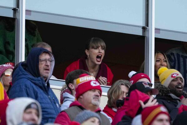 Singer Taylor Swift cheers during the second half of an NFL football game between the Las Vegas Raiders and the Kansas City Chiefs in Kansas City, Mo., Friday, Nov. 29, 2024. (AP Photo/Ed Zurga)