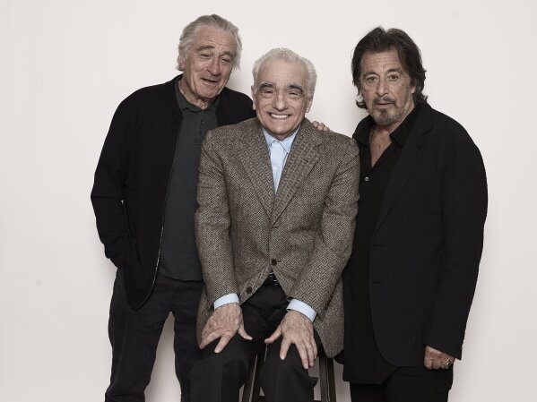 This Sept. 30, 2019 photo shows actor Al Pacino, from right, director Martin Scorsese, and actor Robert De Niro posing for a portrait to promote their upcoming film "The Irishman" in New York. (Photo by Victoria Will/Invision/AP)