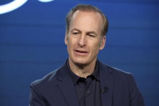 FILE - In this Jan. 16, 2020, file photo, Bob Odenkirk speaks at the AMC's "Better Call Saul" panel during the AMC Networks TCA 2020 Winter Press Tour in Pasadena, Calif. Odenkirk collapsed on the show's New Mexico set Tuesday, July 27, 2021, and had to be hospitalized. Crew members called an ambulance that took the 58-year-old actor to a hospital, where he remained Tuesday night, a person close to Odenkirk who was not authorized to speak publicly on the matter told The Associated Press. (Photo by Willy Sanjuan/Invision/AP, File)