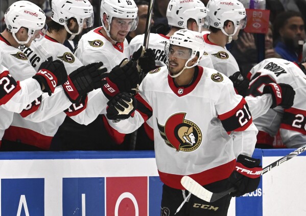 Ottawa Senators right wing Mathieu Joseph (21) celebrates his goal during the second period of an NHL hockey game against the Tampa Bay Lightning Monday, Feb. 19, 2024, in Tampa, Fla. (AP Photo/Jason Behnken)