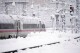 A train is parked at the central station after heavy snow fall in Munich, Germany, Saturday, Dec. 2, 2023. (AP Photo/Matthias Schrader)