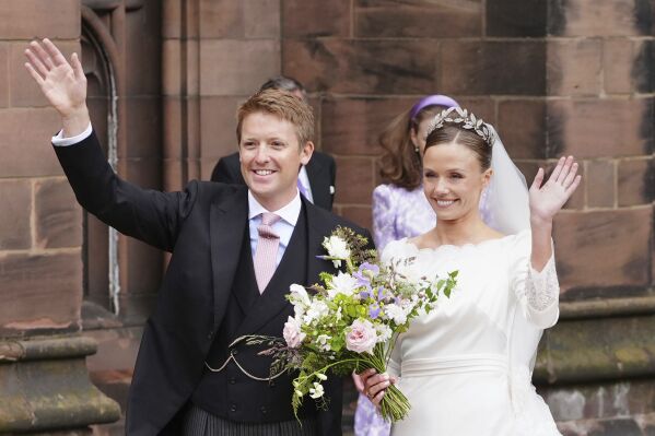 Olivia Henson and Hugh Grosvenor, the Duke of Westminster leave Chester Cathedral after their wedding, Friday June 7, 2024. (Peter Byrne/PA via AP)