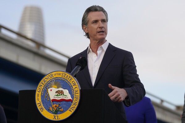 FILE - California Gov. Gavin Newsom speaks during an event in San Francisco, Nov. 9, 2023. Newsom announced Friday, March 29, 2024 that hundreds of new high-tech surveillance cameras are coming to the city of Oakland and state freeways in the East Bay to battle criminal activity and freeway violence. (AP Photo/Jeff Chiu, File)