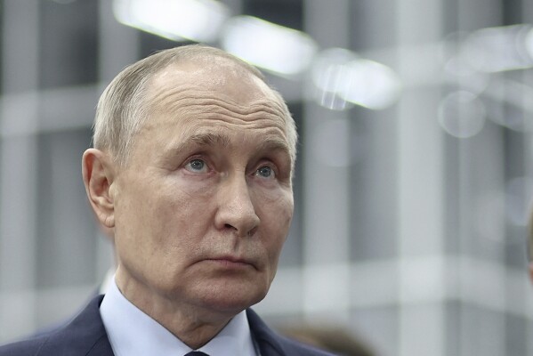 Russian President Vladimir Putin visits the Samara research and production centre for unmanned aircraft systems in Samara, Russia, Tuesday, Jan. 28, 2025. (Mikhail Tereshchenko, Sputnik, Kremlin Pool Photo via AP)
