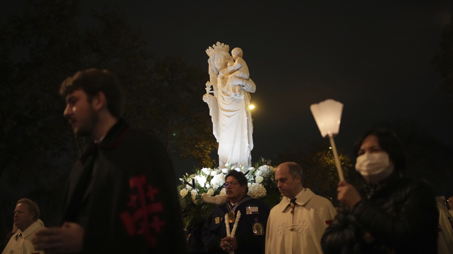 Virgin Mary statue, a logo of resilience, returns to Notre Dame Cathedral 5 years after hearth