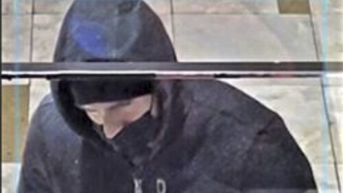 This photo provided by the Las Vegas Metropolitan Police Department shows a suspect captured by security cameras on Jan. 6, 2022, during a robbery at the Aliante hotel-casino in North Las Vegas. The police agency later identified the suspect as Caleb Rogers, who was employed as an active-duty patrol officer at the time of the robbery. Rogers is accused in a series of casino heists in Southern Nevada between November 2021 and February 2022, when he was arrested. His jury trial in U.S. District Court in Las Vegas is set to begin Monday, July 10, 2023. (Las Vegas Metropolitan Police Department via AP)