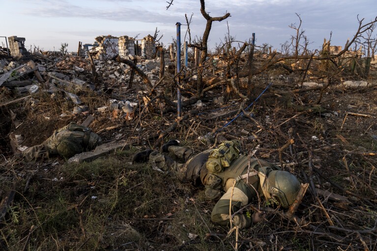 The bodies of Russian soldiers lie at the frontline in Andriivka, Donetsk region, Ukraine, Sept. 16, 2023. (AP Photo/Mstyslav Chernov, File)