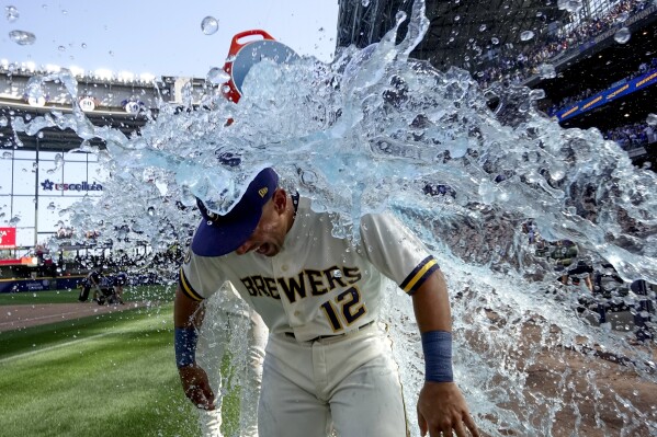 Milwaukee Brewers' Jahmai Jones is douced after a baseball game against the Chicago Cubs Monday, July 3, 2023, in Milwaukee. The Brewers won 8-6. (AP Photo/Morry Gash)