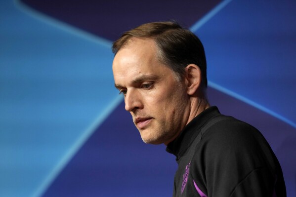 Bayern head coach Thomas Tuchel arrives for a news conference in Munich, Germany, Monday, April 29, 2024, ahead of the Champions League semi final first leg soccer match between FC Bayern Munich and Real Madrid. (AP Photo/Matthias Schrader)