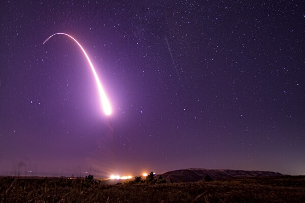 FILE - This image taken with a slow shutter speed on Oct. 2, 2019, and provided by the U.S. Air Force shows an unarmed Minuteman 3 intercontinental ballistic missile test launch at Vandenberg Air Force Base, Calif. The world's nine nuclear-armed states continue to modernize their nuclear weapons as the countries continue to deepen their reliance on such deterrence in 2023, a Swedish think tank said Monday, June 17, 2024. (Staff Sgt. J.T. Armstrong/U.S. Air Force via AP, File)