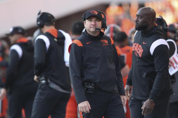 Oregon State head coach Jonathan Smith watches the scoreboard during the second half of an NCAA college football game against Oregon, Saturday, Nov 26, 2022, in Corvallis, Ore. (AP Photo/Amanda Loman)