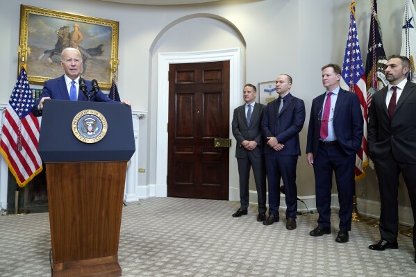 President Joe Biden speaks about artificial intelligence in the Roosevelt Room of the White House, Friday, July 21, 2023, in Washington, as from left, Adam Selipsky, CEO of Amazon Web Services; Greg Brockman, President of OpenAI; Nick Clegg, President of Meta; and Mustafa Suleyman, CEO of Inflection AI, listen. (AP Photo/Manuel Balce Ceneta)