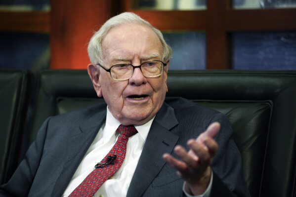 FILE - Berkshire Hathaway Chairman and CEO Warren Buffett speaks during an interview in Omaha, Neb., May 7, 2018. The $200,100 winning bid for a private lunch with software titan Marc Benioff might appear disappointing at first glance after years of multimillion-dollar bids for a private meal with Buffett, but the winner also pledged to donate a total of $1.5 million to the California homeless charity that benefits from the auction. (AP Photo/Nati Harnik, File)