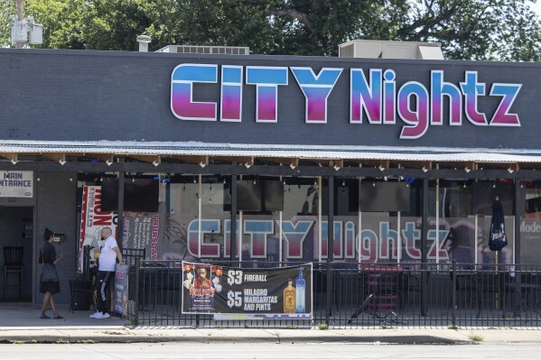 A shooting early Sunday morning, July 2, 2023, at City Nightz nightclub in Wichita, Kan., left multiple people with gunshot wounds and a few more people hospitalized after being trampled in a rush for the exits, police said. Wichita Police Lt. Aaron Moses said investigators believe several shooters opened fire inside the club just before 1 a.m. (Travis Heying/The Wichita Eagle via AP)