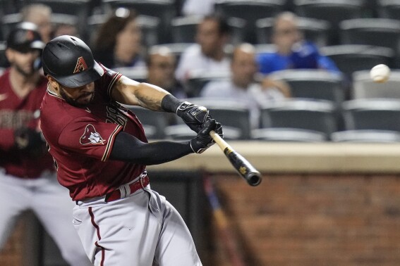 Arizona Diamondbacks' Tommy Pham hits a home run during the eighth inning of a baseball game against the New York Mets, Monday, Sept. 11, 2023, in New York. (AP Photo/Frank Franklin II)