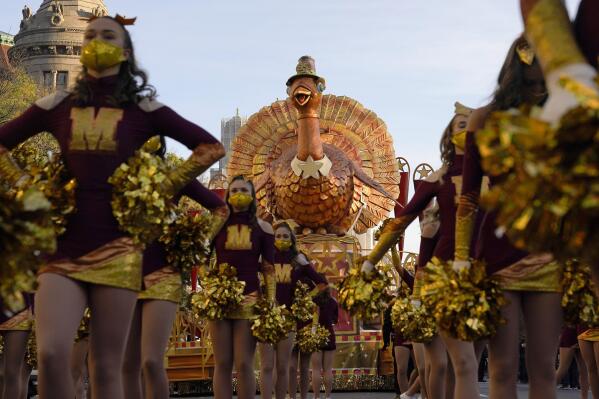 FILE - The Tom Turkey float waits along Central Park West before the start of the Macy's Thanksgiving Day Parade, in New York on Nov. 25, 2021. This year’s parade will feature 16 giant character balloons, 28 floats, 40 novelty and heritage inflatables, more than 800 clowns, 12 marching bands, 700 clowns and 10 performance groups.  (AP Photo/Seth Wenig, File)