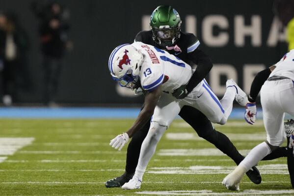 Southern Methodist wide receiver Roderick Daniels Jr. (13) carries during the second half of an NCAA college football game against Tulane in New Orleans, Thursday, Nov. 17, 2022. Tulane won 59-24. (AP Photo/Gerald Herbert)