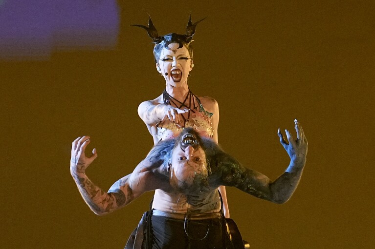 Bambie Thug of Ireland performs the song Doomsday Blue during the Grand Final of the Eurovision Song Contest in Malmo, Sweden, Saturday, May 11, 2024. (AP Photo/Martin Meissner)
