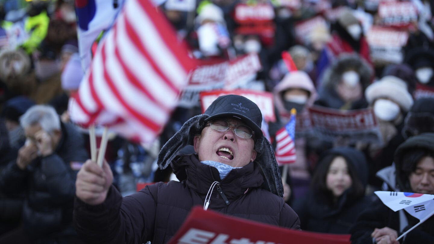 South Korea’s impeached president defies warrant after hourslong standoff