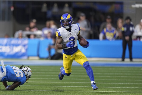 FILE - Los Angeles Rams running back Cam Akers carries the ball during the first half of an NFL football game against the Los Angeles Chargers on Jan. 1, 2023, in Inglewood, Calif. Akers is entering his contract year after three up-and-down seasons in Los Angeles that have included a Super Bowl ring, a torn Achilles tendon and a three-game midseason banishment due to an ugly clash with the coaching staff. (AP Photo/Mark J. Terrill, File)
