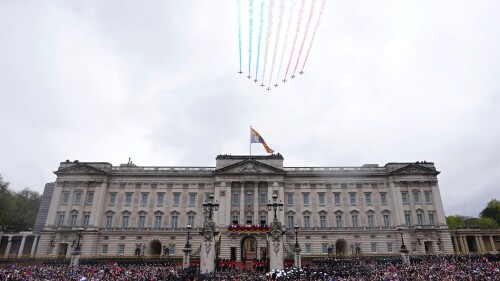 FILE - Britain's King Charles III and Queen Camilla on the balcony of Buckingham Palace watch the Royal Air Force Red Arrows fly over after their coronation ceremony, in London, on May 6, 2023. A change in monarchs, double-digit inflation and ongoing costs of renovating Buckingham Palace contributed to a 5% increase in publicly-funded spending by Britain's royals, royal accounts published Thursday, June 29, 2023 showed. (AP Photo/Petr David Josek, File)