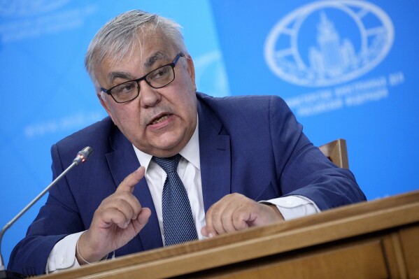 Russian Deputy Foreign Minister Sergey Vershinin speaks to the media at a briefing in Russian Foreign Ministry in Moscow, Russia, Friday, July 21, 2023. Vershinin talked about Russia's decision to withdraw from a deal that allowed Ukraine grain exports through the Black Sea. (AP Photo/Alexander Zemlianichenko, Pool)