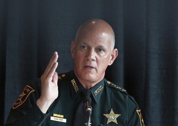 FILE - In this July 10, 2018, file photo, sheriff and chairperson, Bob Gualtieri, of Pinellas county, Fla., speaks during a state commission meeting as they investigate the Marjory Stoneman Douglas High School massacre, in Sunrise, Fla. After a gunman with a history of psychotic behavior killed 17 at a Florida high school two years ago Friday, state lawmakers quickly passed a so-called red flag law that makes it possible for judges, at the request of law enforcement, to ban anyone deemed to be a danger to themselves or others from owning firearms for a year. (AP Photo/Brynn Anderson, File)