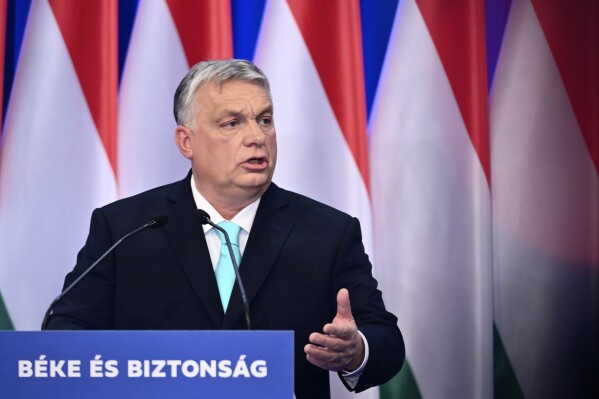 FILE - Hungarian Prime Minister Viktor Orban speaks during a yearly State of the Nation address in Budapest, Hungary, on Feb. 18, 2023. Orban, said in a sprawling interview with former Fox News host Tucker Carlson that the only path to ending the war in Ukraine would be the reelection of Donald Trump to the presidency. (AP Photo/Denes Erdos, File)
