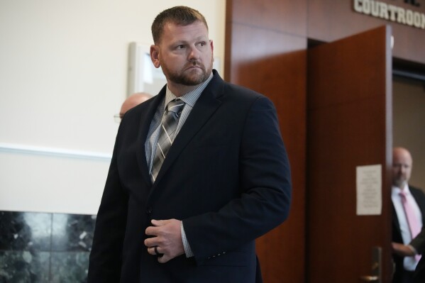 FILE - Former Aurora, Colo., Police Department officer Randy Roedema leaves the courtroom after being convicted of charges in the 2019 death of Elijah McClain during a trial in the Adams County, Colo., Courthouse, Oct. 12, 2023, in Brighton, Colo. The only police officer convicted of killing McClain faces anywhere from probation to several years behind bars when a judge decides his punishment Friday, Jan. 5, 2024. (AP Photo/David Zalubowski, File)