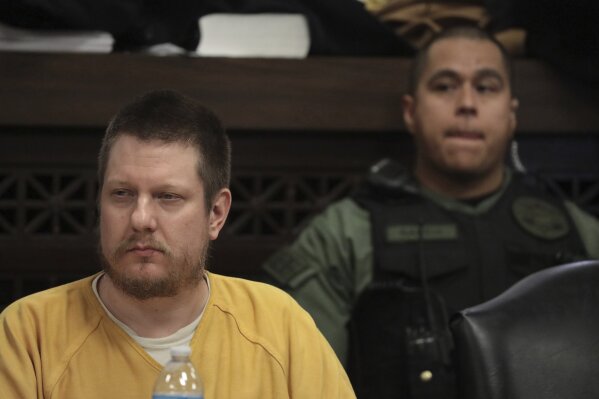 FILE - In this Jan. 18, 2019 file photo, former Chicago police Officer Jason Van Dyke, left, attends his sentencing hearing at the Leighton Criminal Court Building in Chicago, for the 2014 shooting of Laquan McDonald. Chicago's law department released the city's watchdog agency's investigation of the 2014 fatal shooting McDonald by Van Dyke Wednesday, Oct. 9, 2019, the first time the agency's reports have ever been made public. The release comes weeks after the City Council passed an ordinance that gives the law department the power to release the findings of the city's Inspector General's office in cases that involve police officers and other city employees in which somebody died or where there may have been a felony committed and "is of compelling public interest." (Antonio Perez/Chicago Tribune via AP, Pool, File)