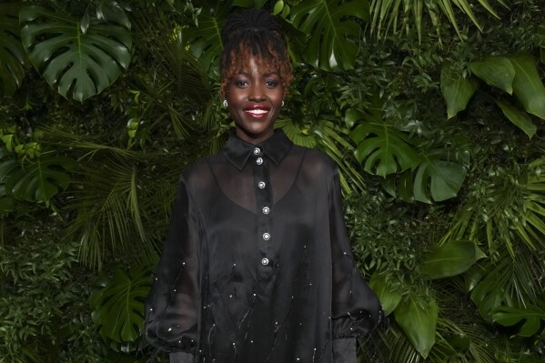 Lupita Nyong'o arrives at Chanel's 16th Annual Pre-Oscar Awards Dinner on Saturday, March 1, 2025, at The Beverly Hills Hotel in Beverly Hills, Calif. (Photo by Jordan Strauss/Invision/AP)