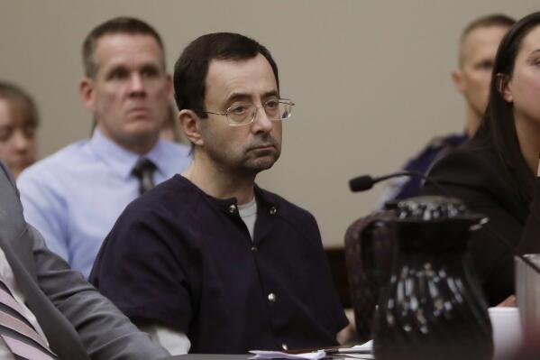 FILE -Larry Nassar sits during his sentencing hearing Wednesday, Jan. 24, 2018, in Lansing, Mich. On Friday, June 17, 2022 the Michigan Supreme Court has rejected a final appeal from sports doctor Larry Nassar, who was sentenced to decades in prison for sexually assaulting gymnasts, including Olympic medalists.  (AP Photo/Carlos Osorio, File)