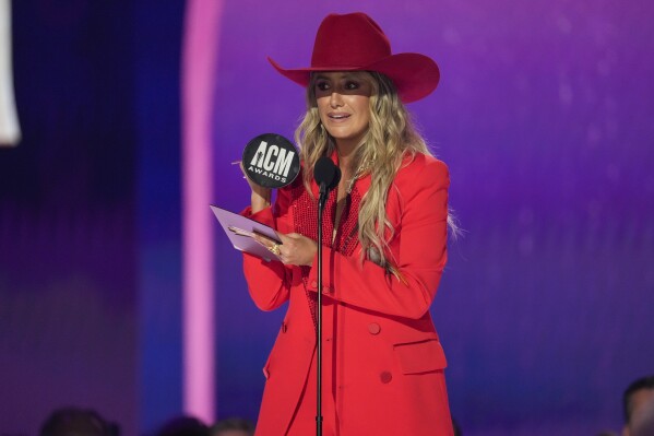 Lainey Wilson accepts the award for entertainer of the year during the 59th annual Academy of Country Music Awards on Thursday, May 16, 2024, at the Ford Center in Frisco, Texas. (AP Photo/Chris Pizzello)