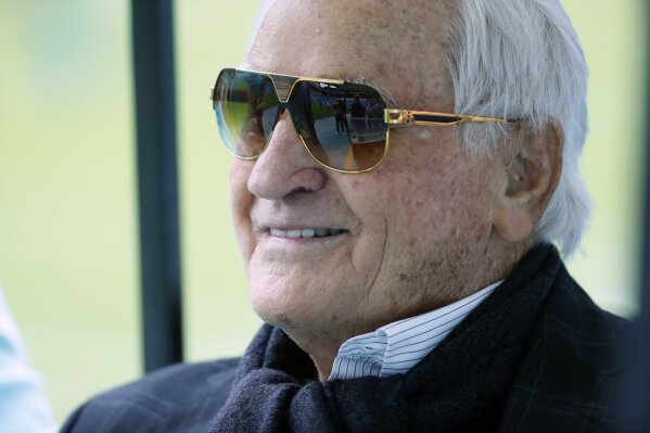FILE - In this Nov. 17, 2019, file photo, former Miami Dolphins head coach Don Shula watches the team before an NFL football game against the Buffalo Bills in Miami Gardens, Fla. Shula, who won the most games of any NFL coach and led the Miami Dolphins to the only perfect season in league history, died Monday, May 4, 2020, at his home in Indian Creek, Fla., the team said. He was 90. (AP Photo/Wilfredo Lee, File)