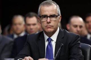 FILE - In this June 7, 2017, file photo, then-acting FBI Director Andrew McCabe appears before a Senate Intelligence Committee hearing about the Foreign Intelligence Surveillance Act, on Capitol Hill in Washington. McCabe has sued the FBI and the Justice Department over his firing.  (AP Photo/Alex Brandon, File)