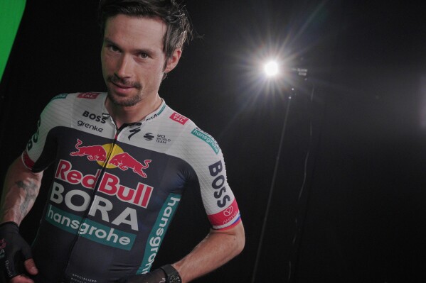 Primoz Roglic poses during team presentations, Wednesday, May 7, 2025 in Tirana, Italy, ahead of the first stage of the Giro d'Italia cycling race. (Marco Alpozzi/LaPresse via AP)