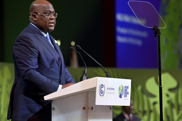 Democratic Republic of Congo's President Felix Tshisekedi delivers his message during a session on Action on Forests and Land Use, during the UN Climate Change Conference COP26 in Glasgow, Scotland, Tuesday, Nov. 2, 2021. (Paul Ellis/Pool Photo via AP)