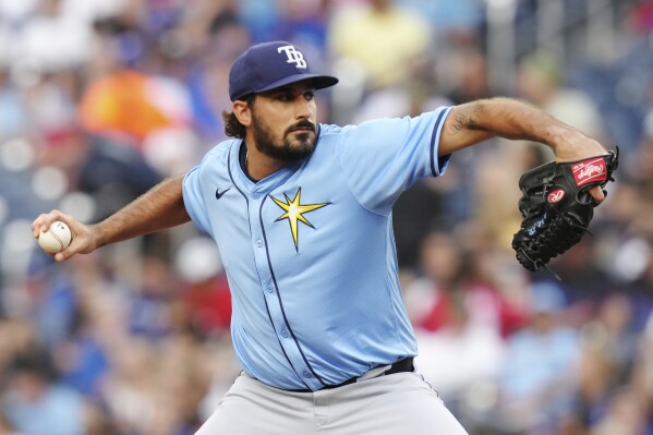 Tampa Bay Rays pitcher Zach Eflin works against the Toronto Blue Jays during the first inning of a baseball game in Toronto on Wednesday, July 24, 2024. (Chris Young/The Canadian Press via ĢӰԺ)