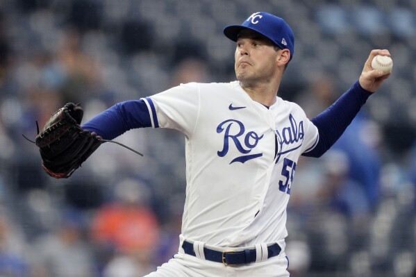 Kansas City Royals starting pitcher Cole Ragans throws during the first inning of a baseball game against the New York Mets Wednesday, Aug. 2, 2023, in Kansas City, Mo. (AP Photo/Charlie Riedel)